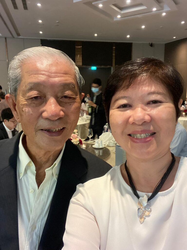 Nah Chin Koon (Lau Lau Ban), founder of Hiap Giap Noodle Manufacturers, with his daughter—honouring his legacy of resilience and dedication in Singapore’s noodle industry.